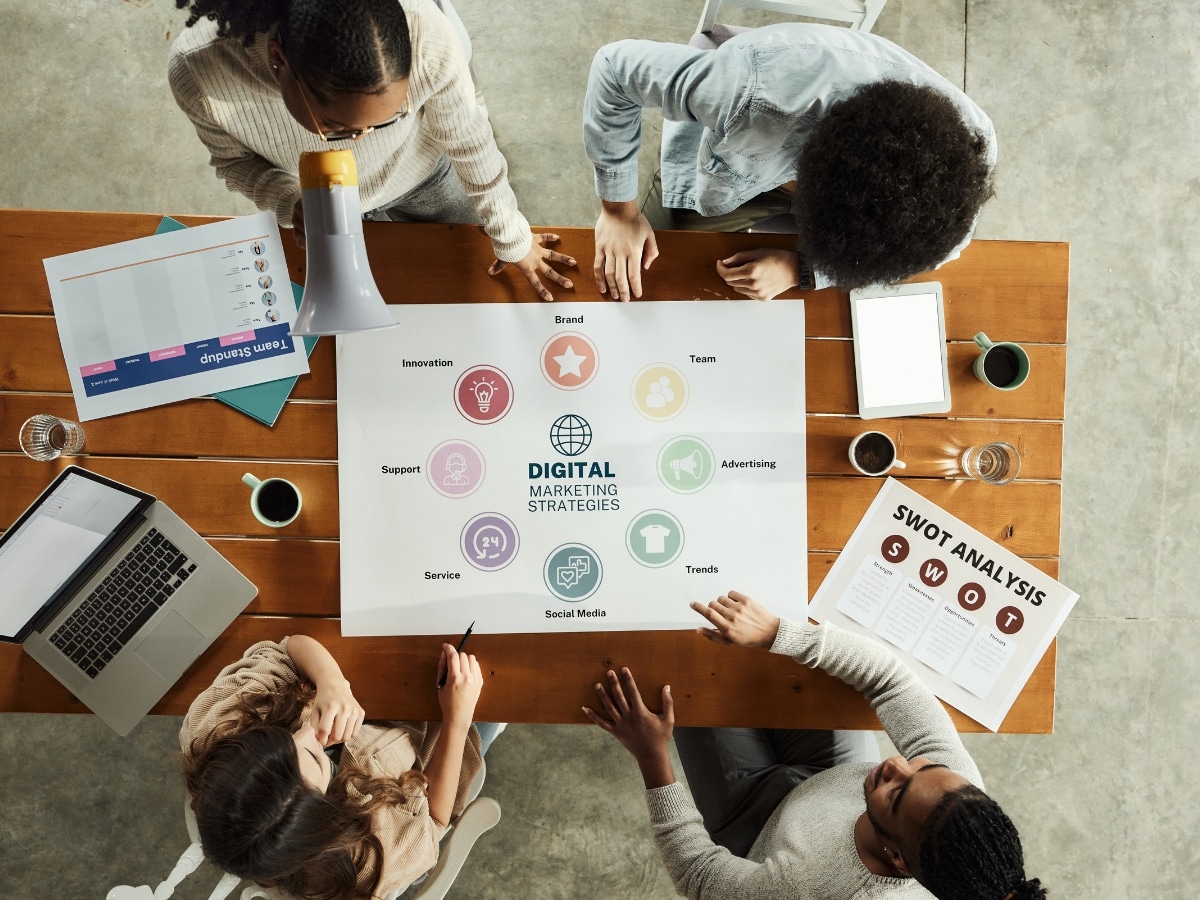 People looking over a Digital Marketing Strategy For Small Businesses